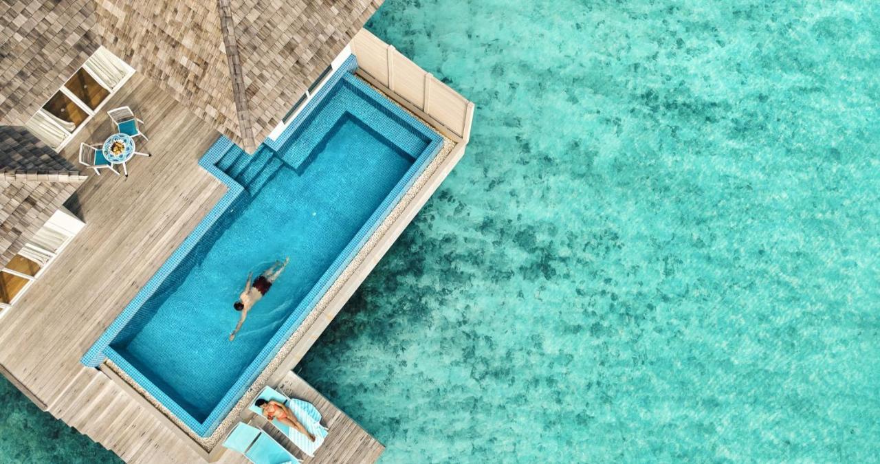 Kandima Maldives Kudahuvadhoo Exteriér fotografie Aerial view of a pool at a resort in Maldives