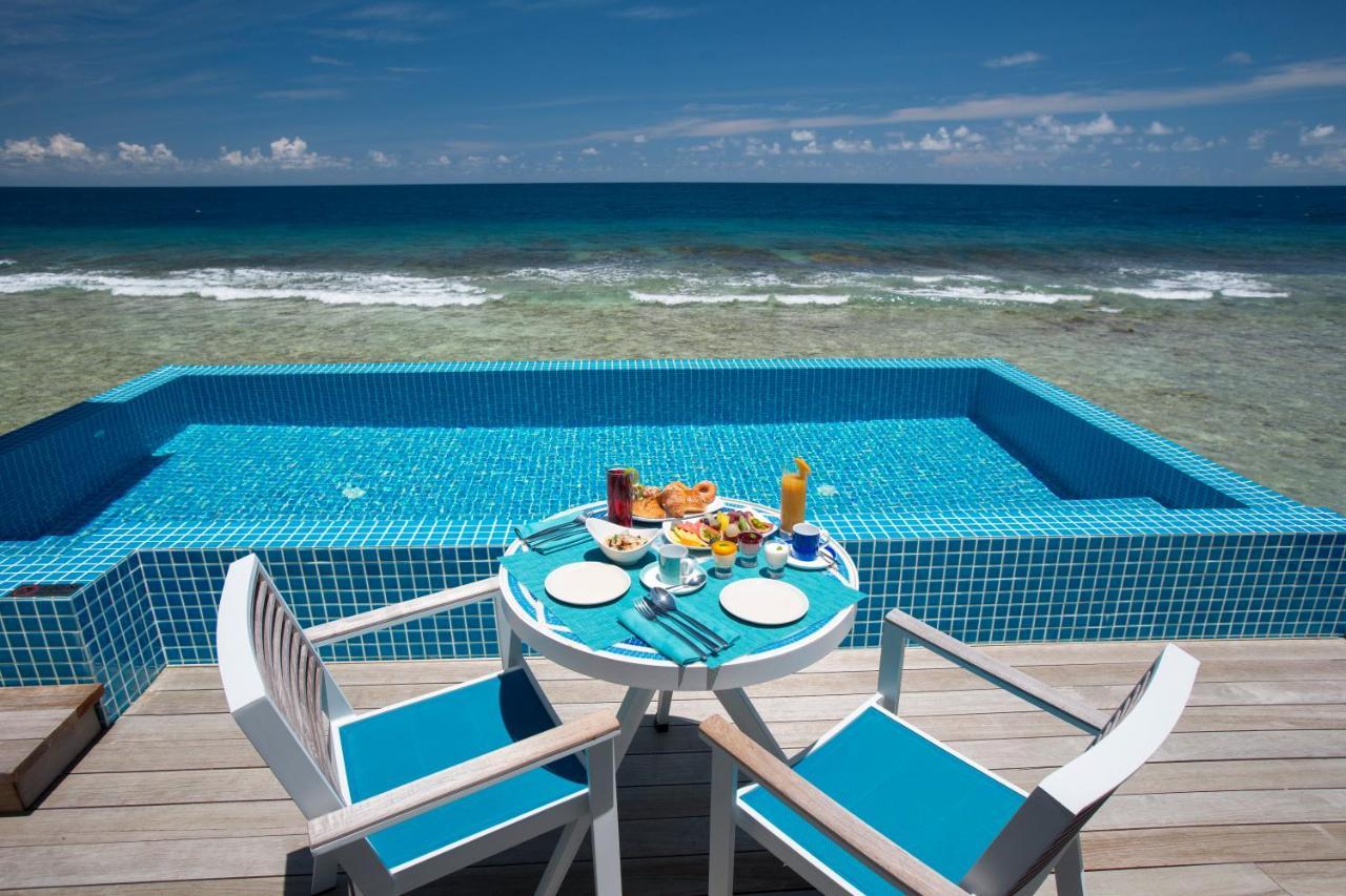 Kandima Maldives Kudahuvadhoo Exteriér fotografie A pool at a resort in Maldives